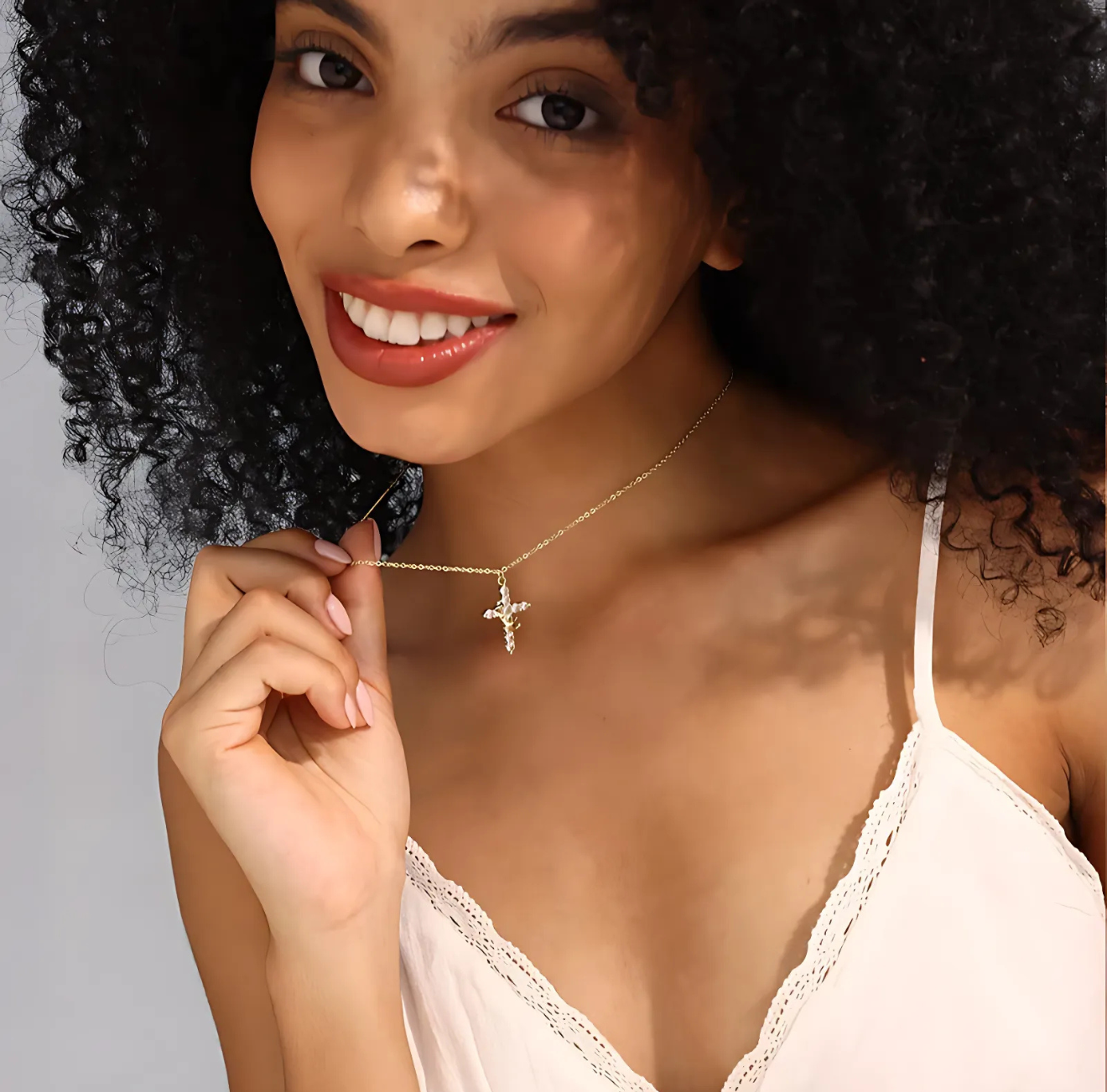 Gold rotatable crown cross necklace by The Infinite Shop