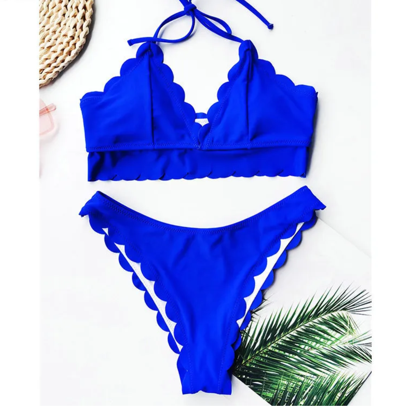 Blue two-piece solid color cut flower swimsuit by The Infinite Shop